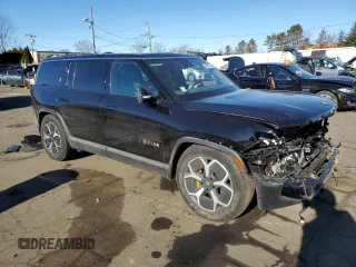 2023 Rivian R1S Adventure with VIN 7PDSGABA2PN014942, listed as a Copart auction lot 88597535 with 0 mi miles and Salvage Title. Bid and sale history available at carsss.com. Image 4.
