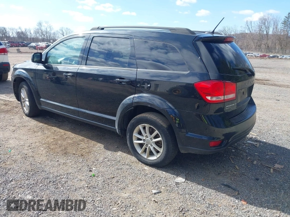 2015 Dodge Journey SXT with VIN 3C4PDDBG6FT561173, listed as a IAAI auction lot 41869022 with 185,106 mi miles and . Bid and sale history available at DreamBid. Image 3.