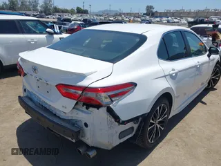 2018 Toyota Camry LE with VIN 4T1B11HK5JU007856, listed as a IAAI auction lot 42531732 with 121,020 mi miles and . Bid and sale history available at DreamBid. Image 4.