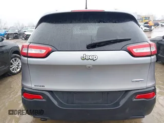 2016 Jeep Cherokee Latitude with VIN 1C4PJLCB7GW273440, listed as a IAAI auction lot 41452456 with 106,048 mi miles. Bid and sale history available at carsss.com. Image 16.