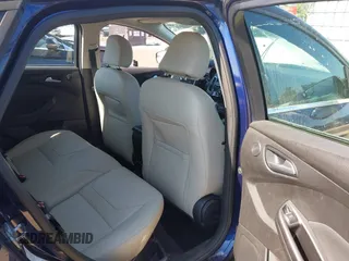 2016 Ford Focus Titanium with VIN 1FADP3N23GL231613, listed as a IAAI auction lot 42645683 with 76,072 mi miles and . Bid and sale history available at DreamBid. Image 8.