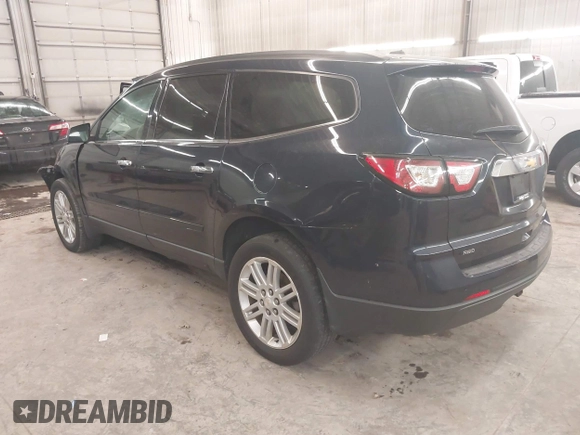 2015 Chevrolet Traverse LT with VIN 1GNKVGKDXFJ310363, listed as a IAAI auction lot 41044106 with 174,139 mi miles and . Bid and sale history available at DreamBid. Image 3.