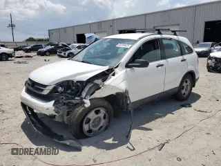 2011 Honda CR-V LX z VIN 5J6RE3H36BL002792, wystawiony jako Copart lot #60259625 z przebiegiem 187 591 mil mil oraz Czysty tytuł • Clean title. Historia ofert i sprzedaży dostępna na DreamBid. Obrazek 1.