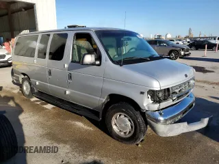 2002 Ford Econoline Passenger XL with VIN 1FMRE11LX2HB04681, listed as a Copart auction lot 60885454 with 114,665 mi miles and Salvage title. Bid and sale history available at DreamBid. Image 4.