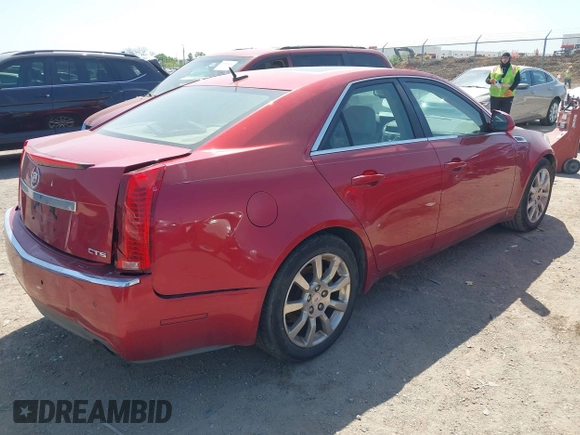 2008 Cadillac CTS RWD w/1SB with VIN 1G6DV57V980213836, listed as a IAAI auction lot 42006005 with 124,596 mi miles. Bid and sale history available at carsss.com. Image 4.