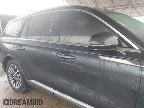 2022 Lincoln Aviator Reserve z VIN 5LM5J7WC2NGL15256, wystawiony jako IAAI lot #41533621 z przebiegiem 35 683 mil mil oraz . Historia ofert i sprzedaży dostępna na DreamBid. Obrazek 13.