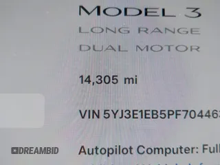 2023 Tesla Model 3 Long Range with VIN 5YJ3E1EB5PF704463, listed as a IAAI auction lot 41916627 with 14,305 mi miles and . Bid and sale history available at DreamBid. Image 15.