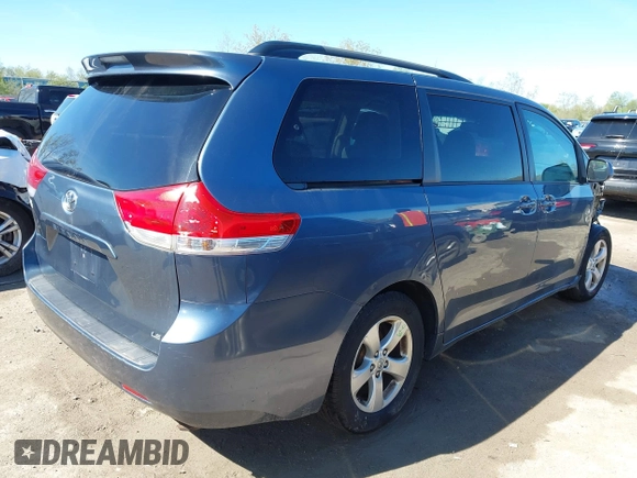 2014 Toyota Sienna LE AAS with VIN 5TDKK3DC4ES464647, listed as a IAAI auction lot 42132627 with 130,724 mi miles and . Bid and sale history available at DreamBid. Image 4.