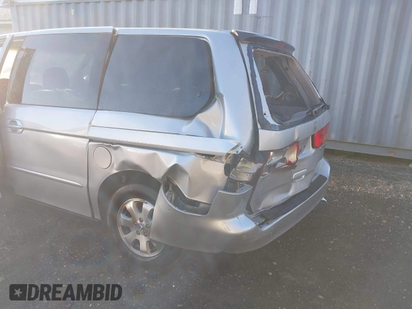 2002 Honda Odyssey EX z VIN 2HKRL18652H566576, wystawiony jako IAAI lot #40974704 z przebiegiem 232 172 mil mil oraz . Historia ofert i sprzedaży dostępna na DreamBid. Obrazek 3.