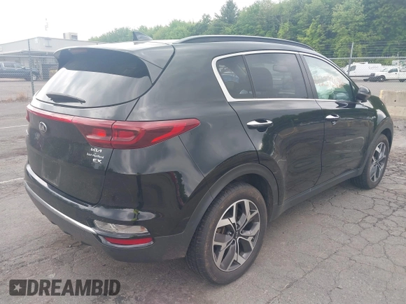 2021 Kia Sportage EX with VIN KNDPNCAC5M7848673, listed as a IAAI auction lot 42373684 with 108,409 mi miles and . Bid and sale history available at DreamBid. Image 4.