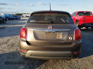 2016 FIAT 500X Trekking Plus z VIN ZFBCFYET2GP386504, wystawiony jako Copart lot #82576594 z przebiegiem 183 959 mil mil oraz Szkoda całkowita • Salvage title. Historia ofert i sprzedaży dostępna na DreamBid. Obrazek 6.