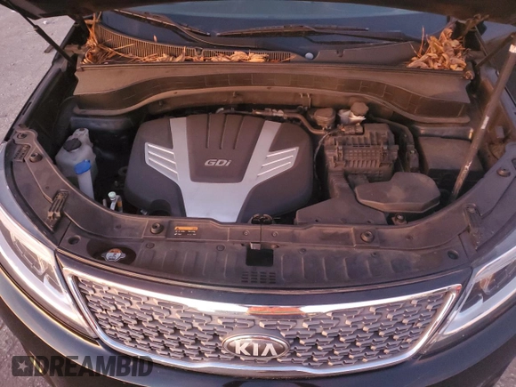2014 Kia Sorento SX Limited z VIN 5XYKWDA77EG466178, wystawiony jako Copart lot #78546154 z przebiegiem 107 867 mil mil oraz Szkoda całkowita • Salvage title. Historia ofert i sprzedaży dostępna na DreamBid. Obrazek 12.