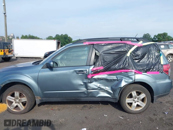 2010 Subaru Forester X Premium with VIN JF2SH6CC5AH773805, listed as a IAAI auction lot 42697368 with 145,467 mi miles and . Bid and sale history available at DreamBid. Image 14.