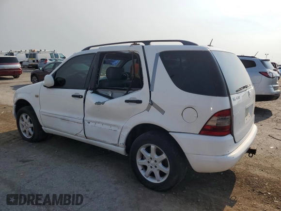 2000 Mercedes-Benz M 320/430/500 with VIN 4JGAB72E8YA200237, listed as a Copart auction lot 65765134 with 194,399 mi miles and Clean title. Bid and sale history available at DreamBid. Image 2.