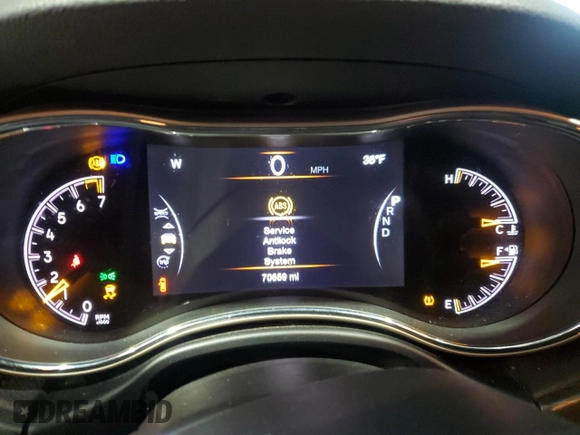2017 Jeep Grand Cherokee Limited 75th Anniversary with VIN 1C4RJFBG3HC843573, listed as a Copart auction lot 86704244 with 70,659 mi miles and Salvage title. Bid and sale history available at DreamBid. Image 9.