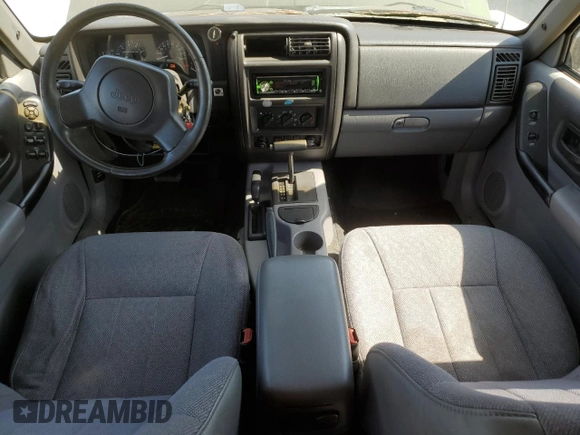 1998 Jeep Cherokee Sport with VIN 1J4FJ68S3WL150458, listed as a Copart auction lot 63278935 with 176,314 mi miles and Clean title. Bid and sale history available at DreamBid. Image 8.