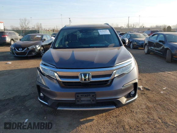 2019 Honda Pilot Touring 7-Passenger with VIN 5FNYF6H69KB050235, listed as a IAAI auction lot 41782057 with 85,907 mi miles. Bid and sale history available at carsss.com. Image 12.