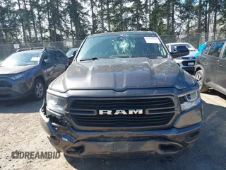 2019 Ram 1500 Big Horn/Lone Star with VIN 1C6SRFFTXKN681543, listed as a IAAI auction lot 41892943 with 86,105 mi miles. Bid and sale history available at carsss.com. Image 12.
