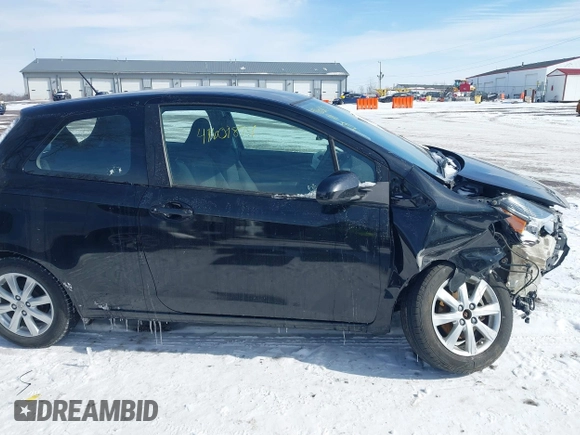 2015 Toyota Yaris L with VIN VNKJTUD34FA055116, listed as a IAAI auction lot 41601874 with 84,508 mi miles. Bid and sale history available at carsss.com. Image 13.