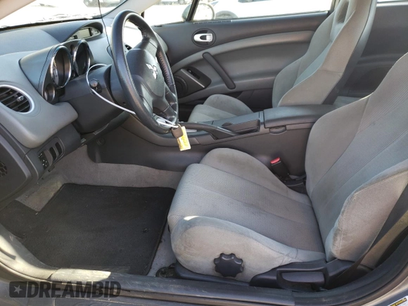 2006 Mitsubishi Eclipse GS z VIN 4A3AK24F46E026361, wystawiony jako Copart lot #47308475 z przebiegiem 168 671 mil mil oraz Szkoda całkowita • Salvage title. Historia ofert i sprzedaży dostępna na DreamBid. Obrazek 7.