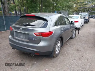 2014 Infiniti QX70 with VIN JN8CS1MW9EM413406, listed as a IAAI auction lot 40269302 with 123,957 mi miles and . Bid and sale history available at DreamBid. Image 4.