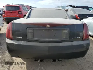 2006 Cadillac XLR z VIN 1G6YV36A965600309, wystawiony jako Copart lot #73937584 z przebiegiem Nie podano mil oraz Szkody całkowita. Historia ofert i sprzedaży dostępna na DreamBid. Obrazek 6.