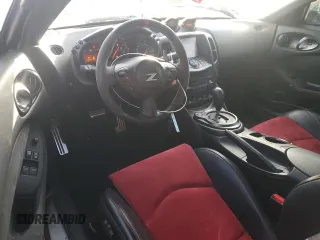 2016 Nissan 370Z z VIN JN1AZ4EH2GM935381, wystawiony jako Copart lot #83220624 z przebiegiem 56 907 mil mil oraz Szkoda całkowita • Salvage title. Historia ofert i sprzedaży dostępna na DreamBid. Obrazek 8.