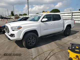 2023 Toyota Tacoma SR z VIN 3TMCZ5ANXPM603961, wystawiony jako Copart lot #66891265 z przebiegiem 20 580 mil mil oraz Czysty tytuł • Clean title. Historia ofert i sprzedaży dostępna na DreamBid. Obrazek 1.