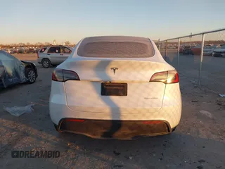 2023 Tesla Model Y Long Range z VIN 7SAYGDEE6PA061228, wystawiony jako IAAI lot #41371547 z przebiegiem 25 121 mil mil oraz . Historia ofert i sprzedaży dostępna na DreamBid. Obrazek 16.