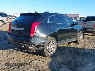 2013 Cadillac SRX Performance Collection with VIN 3GYFNHE31DS594457, listed as a IAAI auction lot 41145250 with 131,395 mi miles. Bid and sale history available at carsss.com. Image 4.