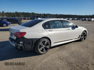 2019 BMW 7 Series 750i with VIN WBA7F0C5XKGM25897, listed as a Copart auction lot 86758004 with 68,700 mi miles and Salvage title. Bid and sale history available at DreamBid. Image 3.