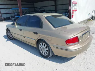 2003 Hyundai Sonata GLS with VIN KMHWF35H03A901839, listed as a IAAI auction lot 40601987 with 171,580 mi miles. Bid and sale history available at carsss.com. Image 3.