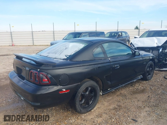 1998 Ford Mustang GT z VIN 1FAFP42X3WF104453, wystawiony jako IAAI lot #41551590 z przebiegiem 109 517 mil mil oraz . Historia ofert i sprzedaży dostępna na DreamBid. Obrazek 4.