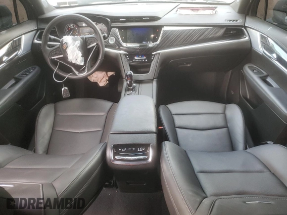 2025 Cadillac XT6 AWD Premium Luxury z VIN 1GYKPDRS8SZ118323, wystawiony jako Copart lot #56156145 z przebiegiem 12 406 mil mil oraz Tytuł czysty. Historia ofert i sprzedaży dostępna na DreamBid. Obrazek 8.