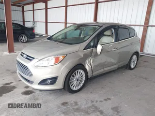2016 Ford C-Max SEL z VIN 1FADP5BUXGL106531, wystawiony jako IAAI lot #42341433 z przebiegiem 74 854 mil mil oraz . Historia ofert i sprzedaży dostępna na DreamBid. Obrazek 2.