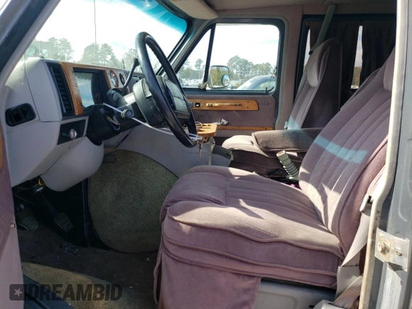 1994 Chevrolet Chevy Van с VIN 1GBEG25K5RF123489, выставлен на аукционе Copart как лот 79491854 с пробегом 82 970 миль миль и Списание • Salvage title. История ставок и продаж доступна на DreamBid. Изображение 7.