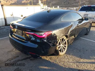 2022 BMW 4 Series 430i xDrive with VIN WBA73AP00NCJ16822, listed as a IAAI auction lot 41329235 with 30,570 mi miles and . Bid and sale history available at DreamBid. Image 4.
