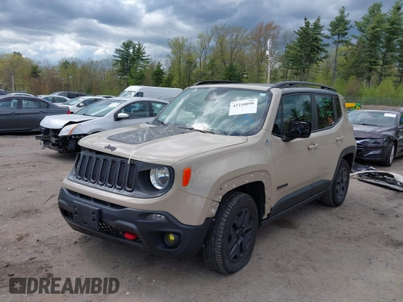2017 Jeep Renegade Trailhawk z VIN ZACCJBCB8HPE88509, wystawiony jako IAAI lot #42210098 z przebiegiem 114 832 mil mil oraz . Historia ofert i sprzedaży dostępna na DreamBid. Obrazek 2.