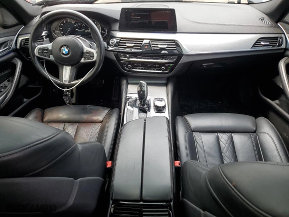 2018 BMW 5 Series M550i xDrive with VIN WBAJB9C51JB286700, listed as a Copart auction lot 64681004 with 76,304 mi miles and Salvage Title. Bid and sale history available at carsss.com. Image 8.