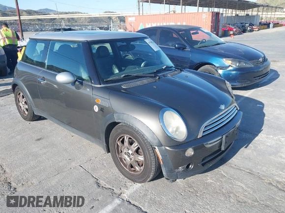2006 MINI Hardtop with VIN WMWRC33586TJ75043, listed as a IAAI auction lot 41948235 with 138,402 mi miles and . Bid and sale history available at DreamBid. Image 1.