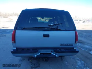 1996 Chevrolet Tahoe with VIN 1GNEK13R3TJ318572, listed as a IAAI auction lot 41419555 with 199,201 mi miles. Bid and sale history available at carsss.com. Image 16.