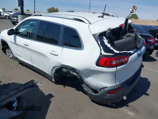 2016 Jeep Cherokee High Altitude with VIN 1C4PJLDB0GW249558, listed as a IAAI auction lot 41851549 with 128,638 mi miles. Bid and sale history available at carsss.com. Image 15.