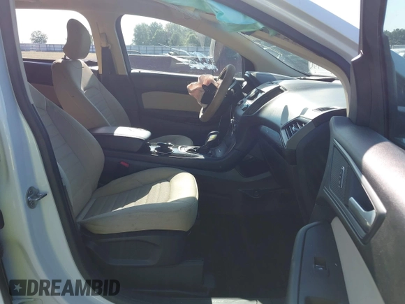 2015 Ford Edge SE z VIN 2FMTK3G92FBC22197, wystawiony jako IAAI lot #42578472 z przebiegiem 100 878 mil mil oraz . Historia ofert i sprzedaży dostępna na DreamBid. Obrazek 5.
