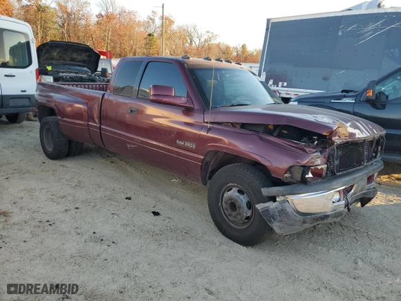2001 Dodge Ram 3500 with VIN 1B7MC33671J599792, listed as a Copart auction lot 80102234 with 261,354 mi miles and Salvage Title. Bid and sale history available at carsss.com. Image 4.