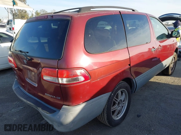 2002 Toyota Sienna CE with VIN 4T3ZF19C12U438162, listed as a IAAI auction lot 41725040 with 241,080 mi miles. Bid and sale history available at carsss.com. Image 4.