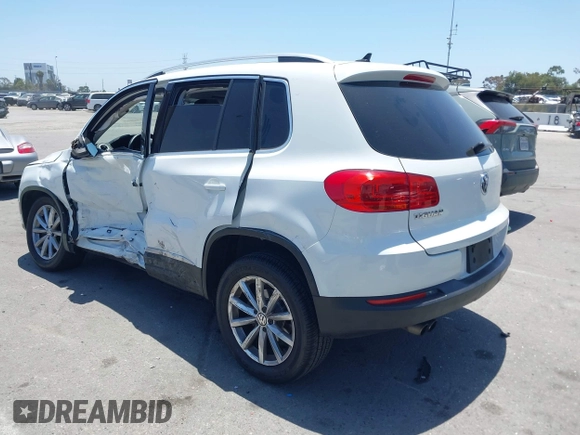 2017 Volkswagen Tiguan Wolfsburg Edition with VIN WVGRV7AX4HW502964, listed as a IAAI auction lot 42538054 with 104,530 mi miles and . Bid and sale history available at DreamBid. Image 3.