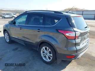 2018 Ford Escape SE z VIN 1FMCU9GD6JUD55937, wystawiony jako IAAI lot #41898592 z przebiegiem 37 800 mil mil oraz . Historia ofert i sprzedaży dostępna na DreamBid. Obrazek 3.
