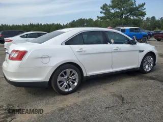 2010 Ford Taurus Limited with VIN 1FAHP2FW4AG144445, listed as a Copart auction lot 56878295 with 148,439 mi miles and Salvage title. Bid and sale history available at DreamBid. Image 3.