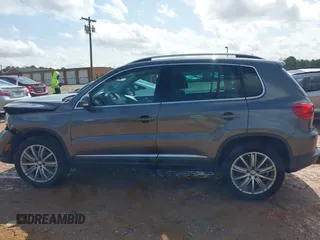 2015 Volkswagen Tiguan SE z VIN WVGBV7AXXFW503955, wystawiony jako IAAI lot #41730076 z przebiegiem 146 446 mil mil oraz . Historia ofert i sprzedaży dostępna na DreamBid. Obrazek 15.