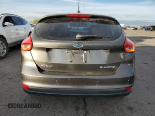 2015 Ford Focus Electric with VIN 1FADP3R40FL348785, listed as a Copart auction lot 84516374 with 85,633 mi miles and Salvage title. Bid and sale history available at DreamBid. Image 6.